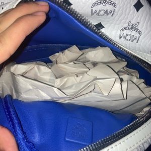 Brand new mcm bag with dust bag comes with tags never worn steal price.